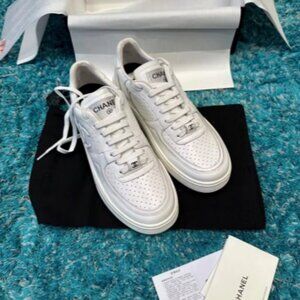 CHANEL Chanel Bow-Tie Round-Toe Low-Top Sneaker for Men, White